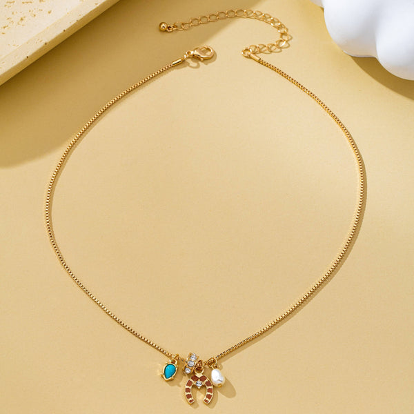 Southwest Horseshoe & Turquoise Charm Necklace | 80N93130: Gold