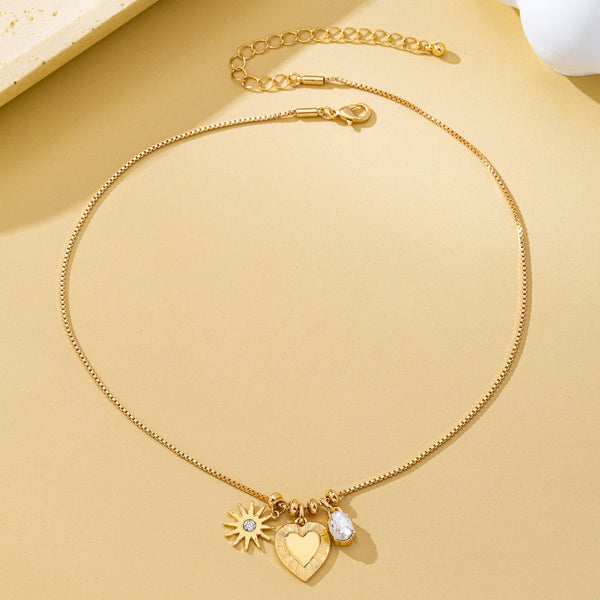 Celestial Heart and Starburst Charm Necklace | 80N93135: Gold